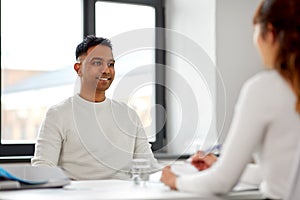 Employee having interview with employer at office