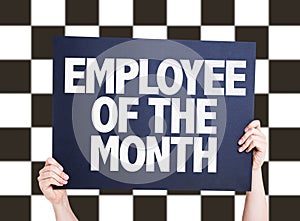 Employee of the Month card on checkered background