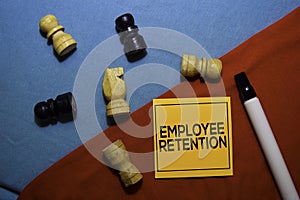 Employee Retention on sticky Notes isolated on Office Desk background.