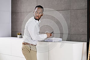 Employee Stealing Documents In Office Using Phone