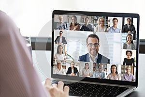 Employee talk on webcam conference with diverse colleagues