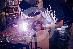 Employee welding aluminum