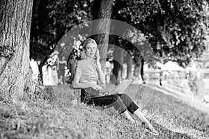 Employee work outdoors. Girl laptop outdoors. Being outdoors exposes workers to fresher air and environmental variations