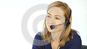 Employee working in a call center. Headset telemarketing woman talking on helpline. slow motion