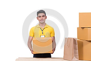 Employees cargo delivery man holding box for service