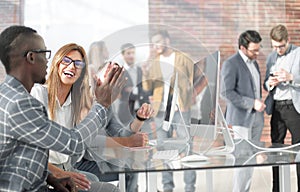 Employees of the company hold a briefing in the office