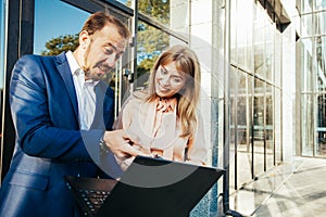 Employees discussing financial data