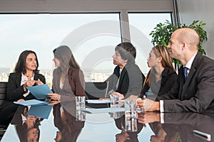 Employees talking in a motivation seminar