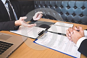 Employer arriving for a job interview, businessman listen to candidate answers explaining about his profile and colloquy dream job