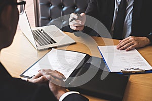 Employer arriving for a job interview, businessman listen to candidate answers explaining about his profile and colloquy dream job