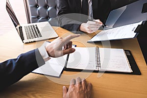 Employer arriving for a job interview, businessman listen to candidate answers explaining about his profile and colloquy dream job