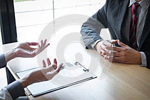 Employer arriving for a job interview, businessman listen to candidate answers explaining about his profile and colloquy dream job