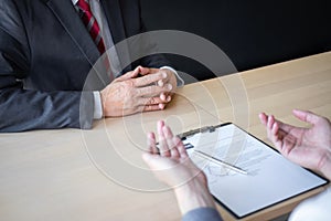 Employer arriving for a job interview, businessman listen to candidate answers explaining about his profile and colloquy dream job