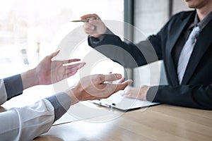 Employer arriving for a job interview, businessman listen to candidate answers explaining about his profile and colloquy dream job