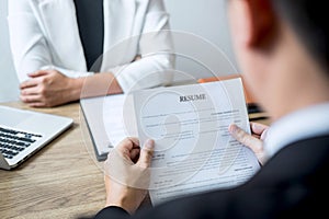 Employer arriving for a job interview, businessman listen to candidate answers explaining about his profile and colloquy dream job