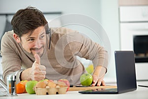 employer having skype conference while cooking
