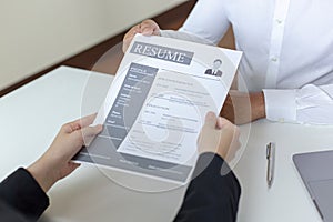 Employer or HR department is reading the resume and interviewing the ability of new employees