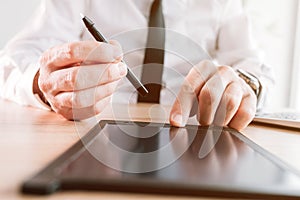 Employer offers stylus pen for electronic signature or e-sign of employment contract agreement