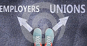 Employers and unions as different choices in life - pictured as words Employers, unions on a road to symbolize making decision and