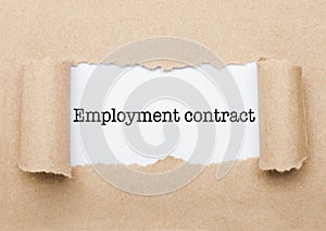 Employment contract text appearing behind paper