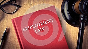 Employment Law and gavel on a table. Law and legal concept