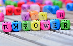 Empower word on table photo