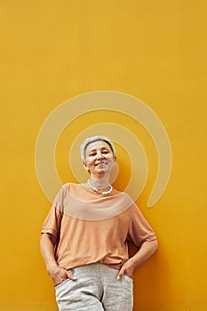 Empowered Mature Woman on Yellow