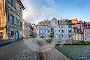 Empress Cunigunde Statue and Heller Haus at Lower Bridge Untere Brucke - Bamberg, Bavaria, Germany photo