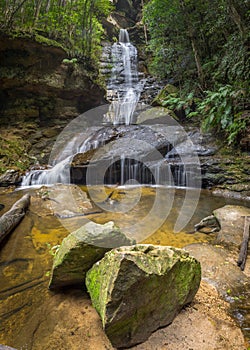 empress falls with large rocks in foreground at katoomba in the blue mountains