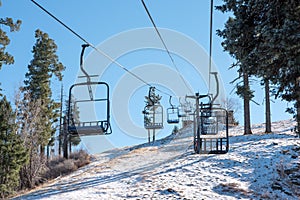 Empty Ski lift chairs