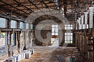Empty abandoned industrial factory interior