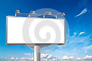 Empty advertisement hoarding at sky background