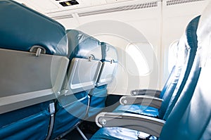 Empty aircraft seats and windows. Travel background