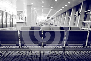 Empty airport seats close up background.