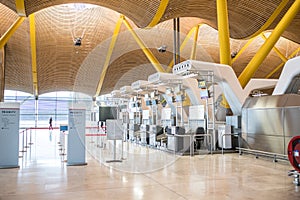 Empty airport terminal and check-in counters