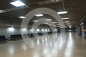 empty airport terminal with emergency lights and sirens, indicating emergency situation