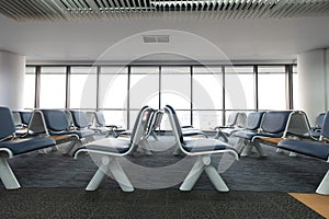 Empty airport terminal waiting area with chairs lounge with seat