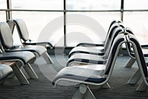 Empty airport terminal waiting area with chairs lounge with seat