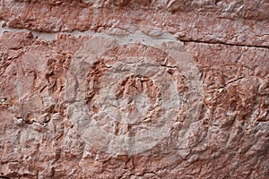 Empty ancient raw rough nature pink red stone concrete texture wall for retro restaurant, website