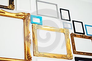 Empty art frames on gallery wall, decor and design