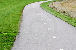 Empty asphalt bike path