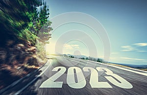 Empty asphalt road and New year 2023 concept