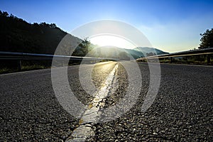 Empty Asphalt road tarmac on a blue sky