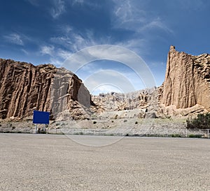 Empty asphalt road with xinjiang geological landscape