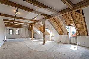 Empty attic rooms after ceiling and wall work photo