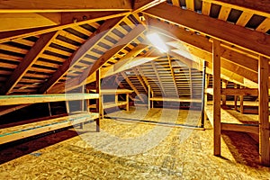 Empty attic with storage shelves