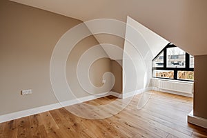 Empty attic style residential room