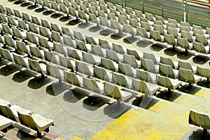 Empty audience white seats at soccer stadium