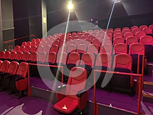 Empty auditorium with red seating