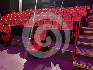 Empty auditorium with red seating